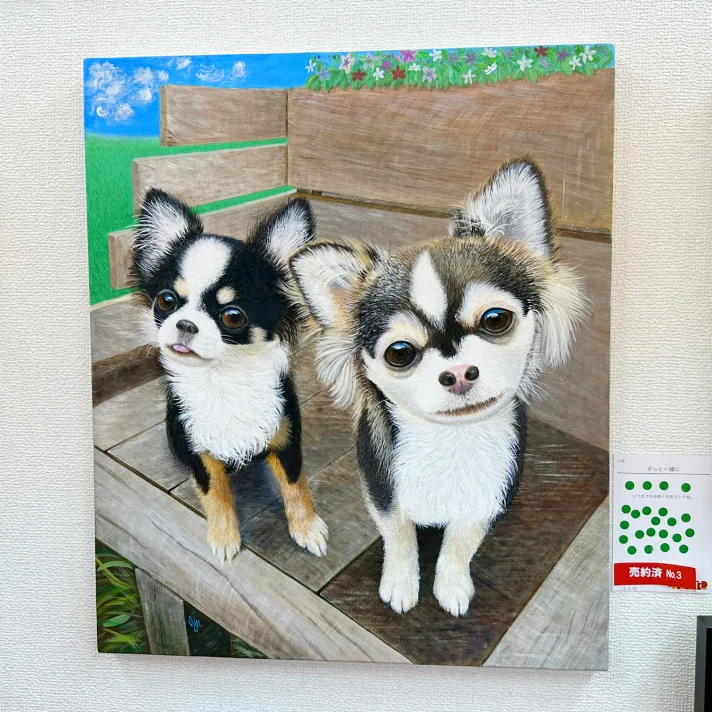 二匹の犬の絵画